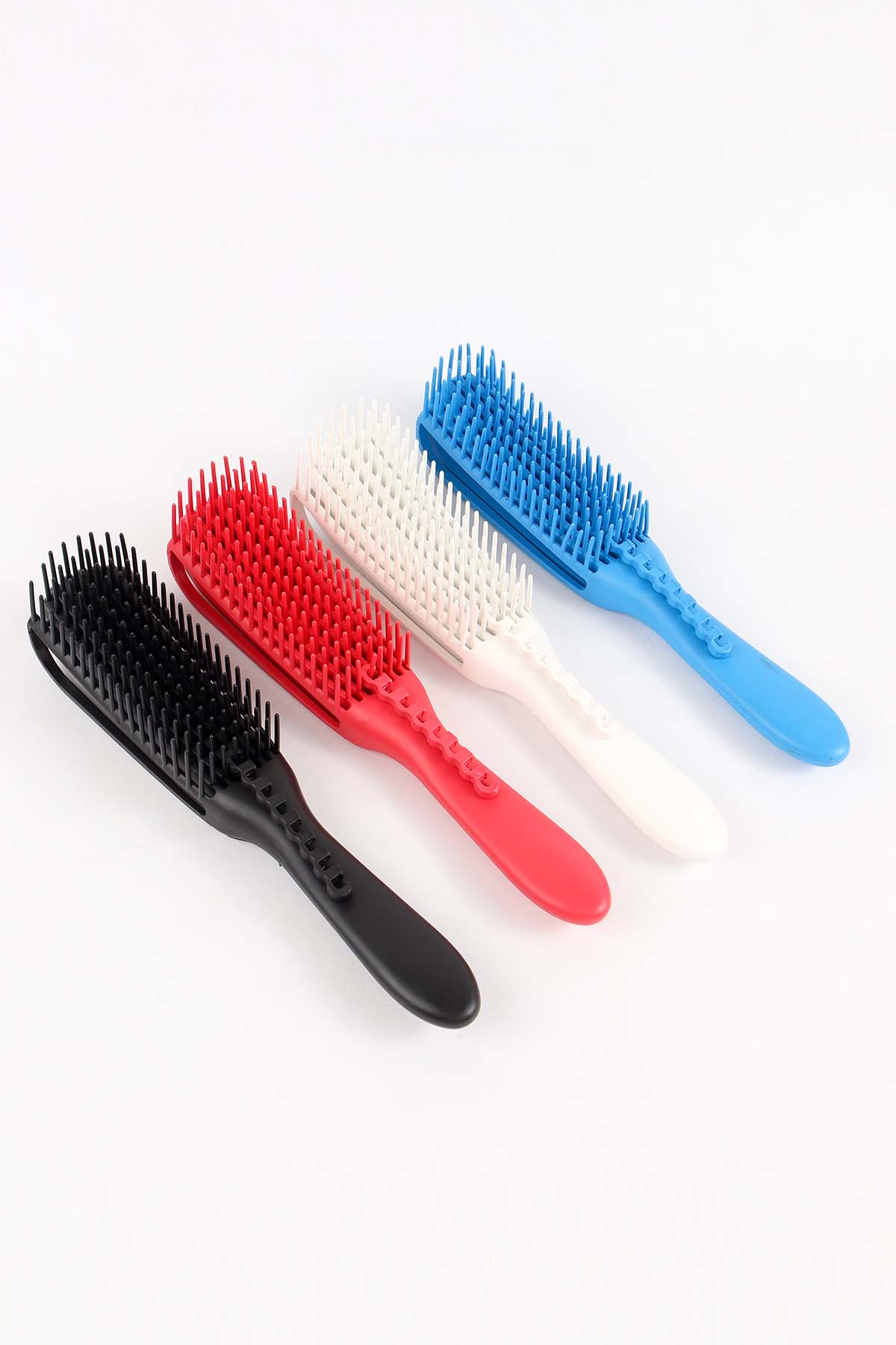 Expandable comb for curly hair