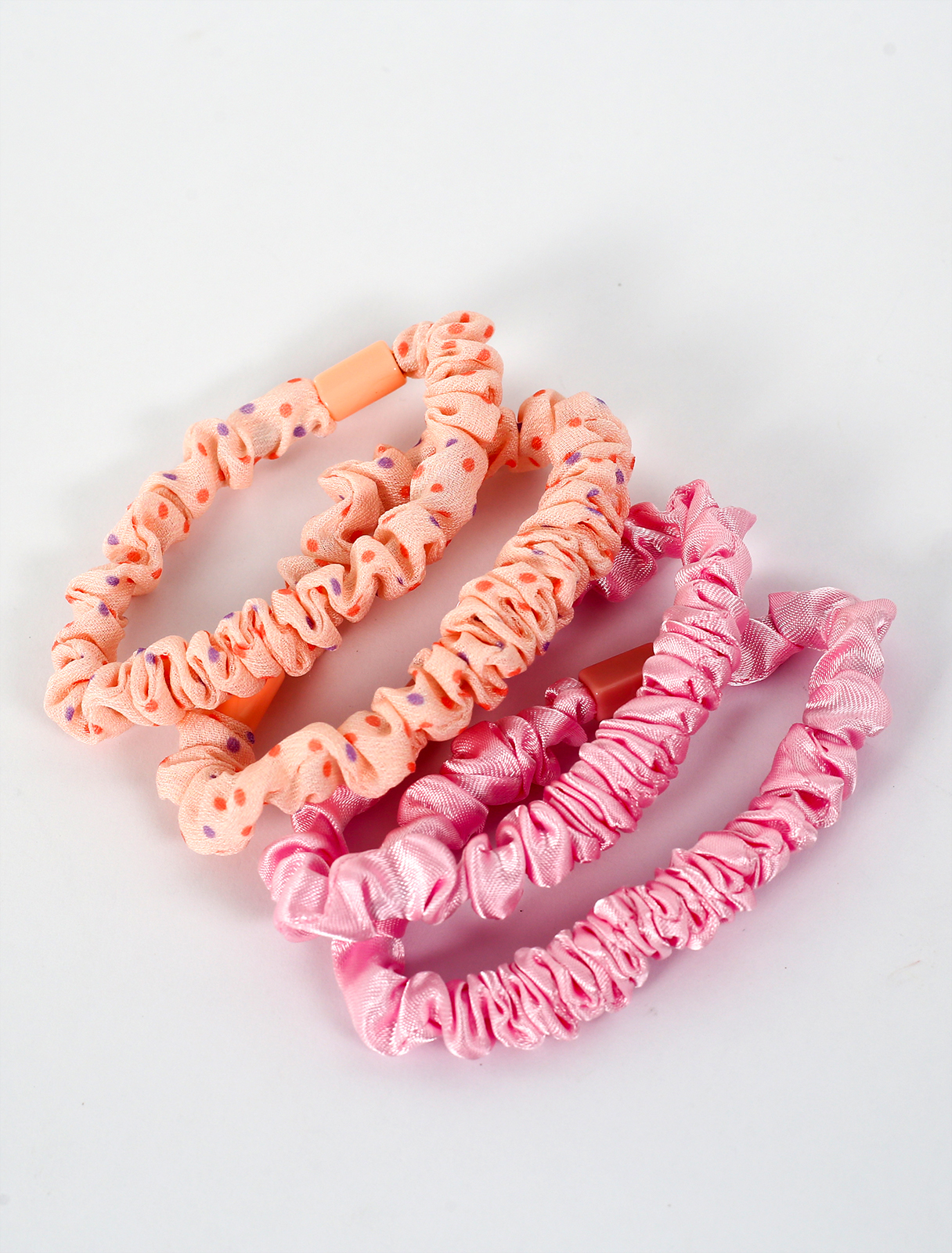 A set of 4-piece fabric hair ties