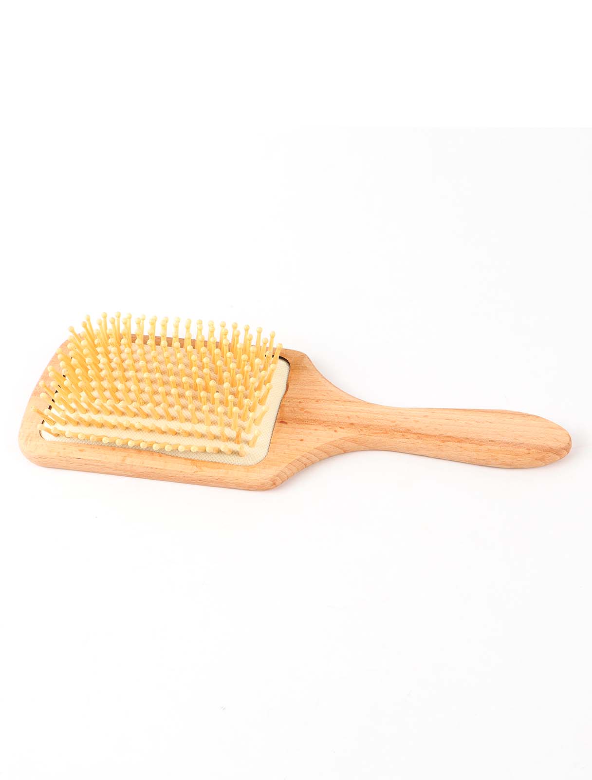 Natural wood hair brush with a rectangular design