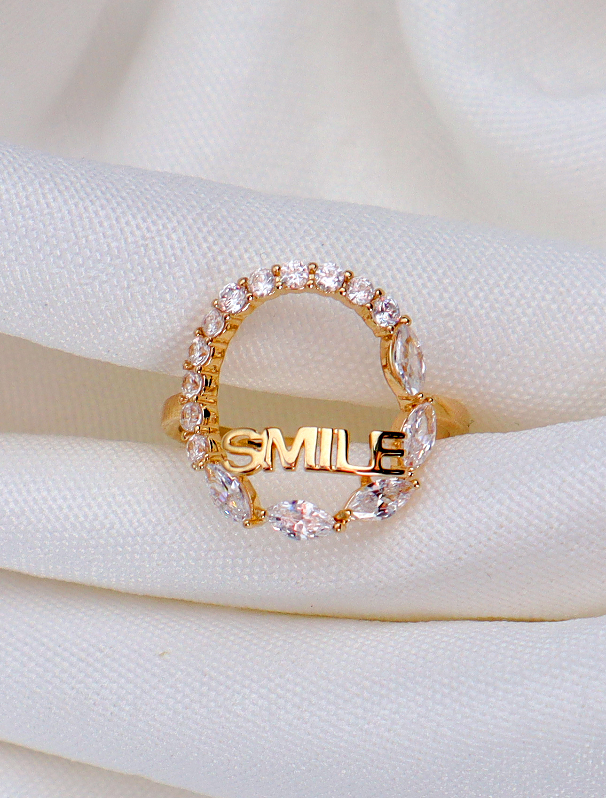 Circle design ring with the word Smile decorated with crystals